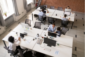 People sitting at desk in workspace