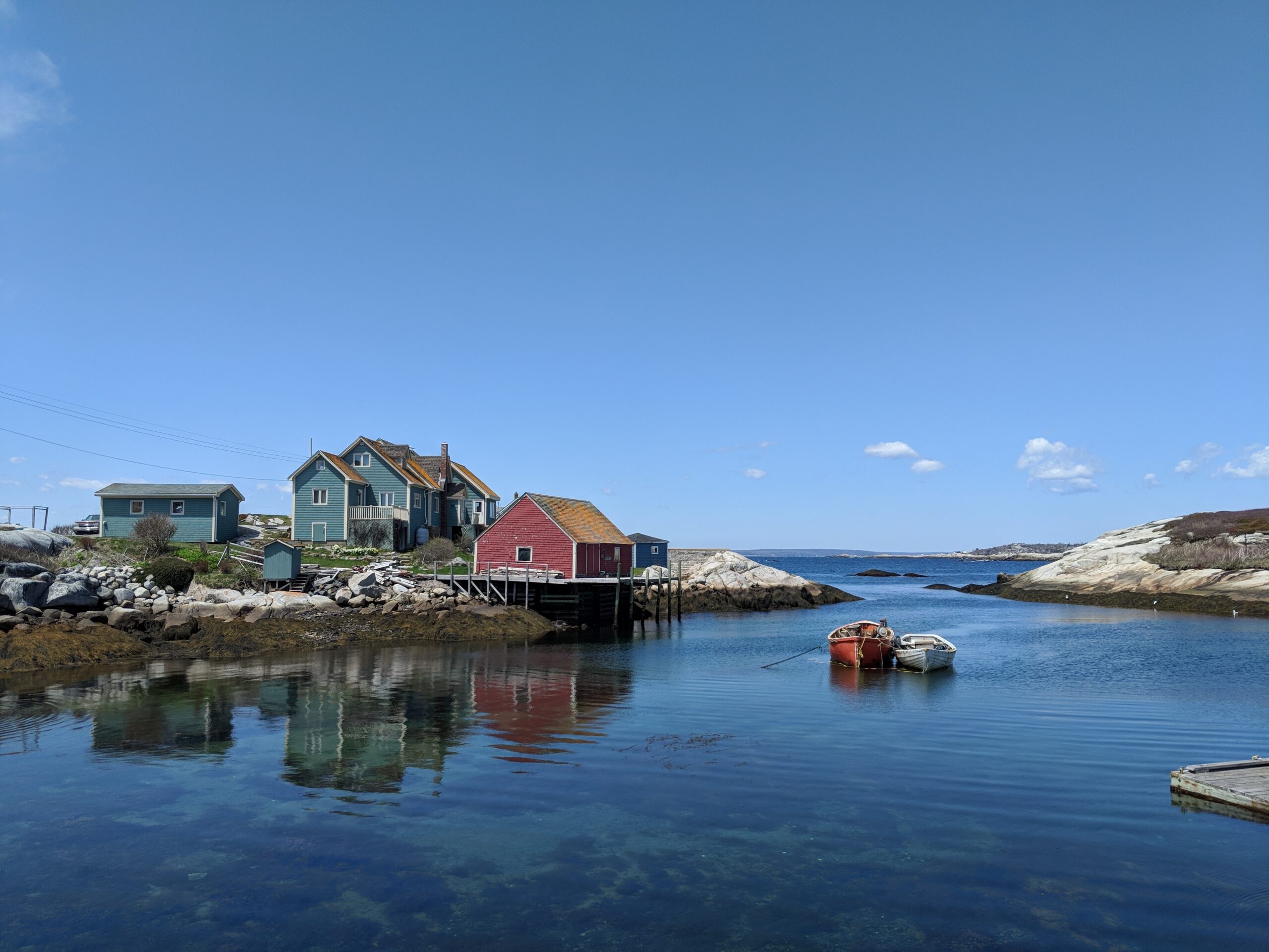 Nova Scotia water with houses on rocky area